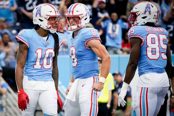 Tennessee Titans quarterback Will Levis (8) reacts after wide receiver DeAndre Hopkins (10) received a pass for a touchdown against the Atlanta Falcons during the first quarter at Nissan Stadium in Nashville